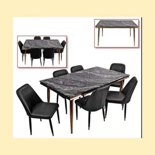 Premium dining table set Abu Dhabi featuring sleek black finish and comfortable chairs — perfect for family dining.