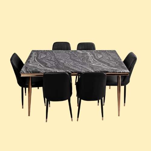 Dining set Abu Dhabi — durable wooden table with stylish black dining chairs for modern interiors.