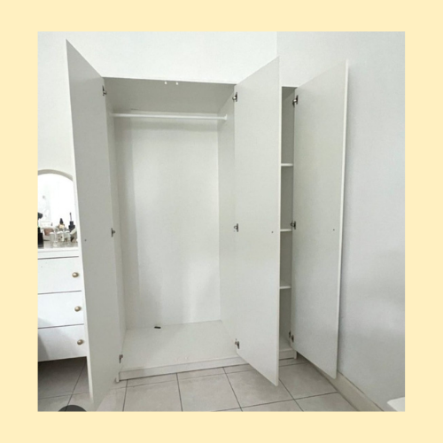 “White wooden wardrobe with shelves and hanging space – Abu Dhabi furniture store”