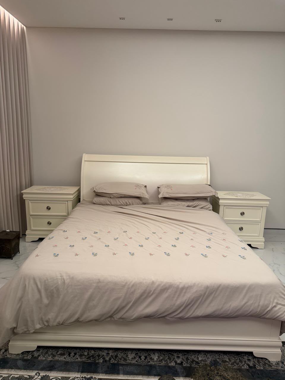 Affordable cream white used bedroom set with two nightstands in Abu Dhabi