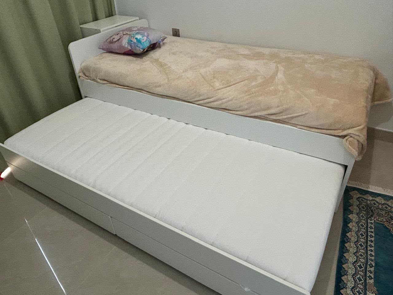 White pull-out daybed with two mattresses in Abu Dhabi