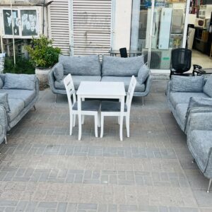 Modern grey fabric used sofa set in Abu Dhabi with chrome legs displayed at Fairy of Fortune store
